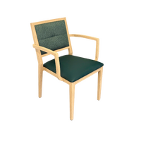 Handrix Dining Chair Stackable. Faux Leather Seat. Backrest in green fabric